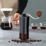 آسیاب دستی قهوه رنگ طوسی مخزن شیشه ای دسته چوبی - تصویر 3